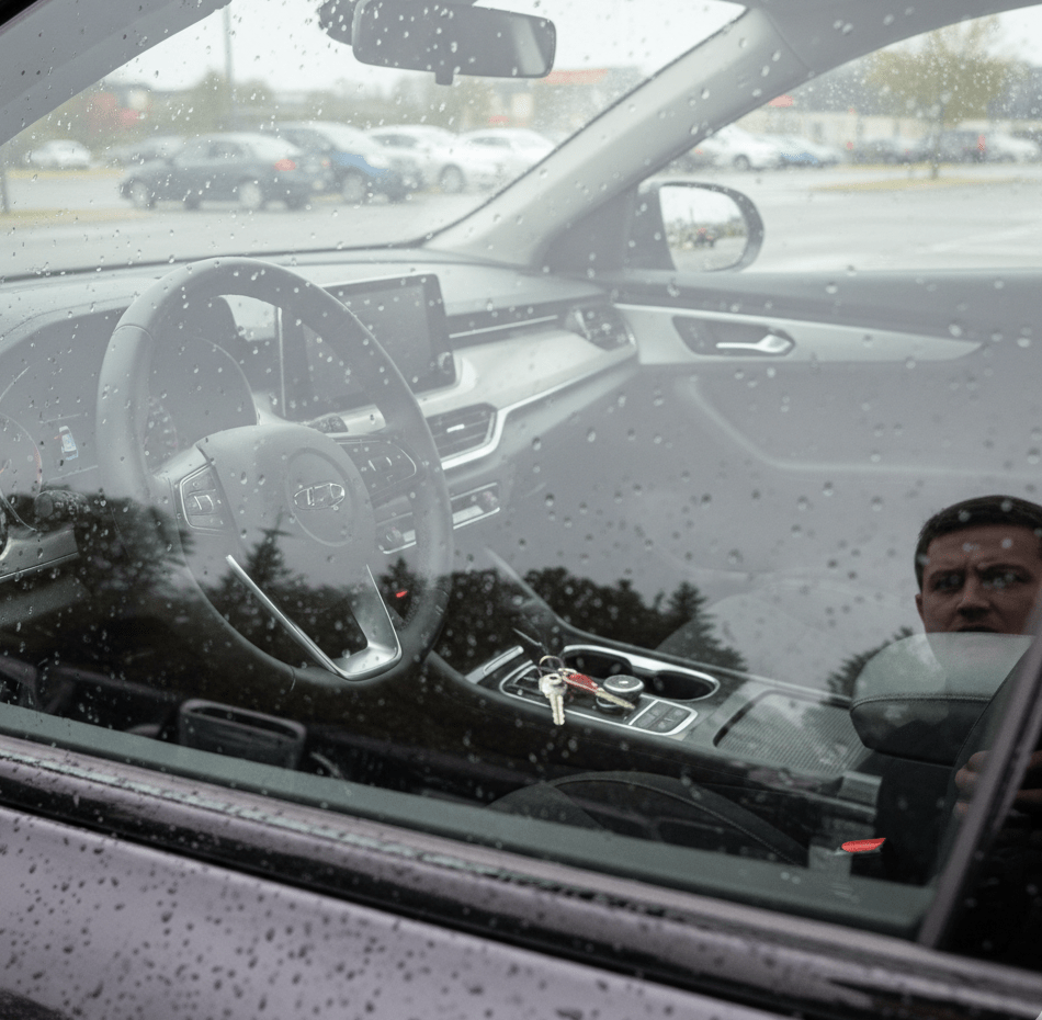 Interior view of a car with keys on the console, highlighting locksmith services for key cutting and lock repair in Charlotte.